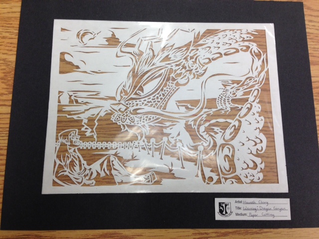 Gr.12 Paper cutting project. H. created and cut out this effective project. Open Gallery